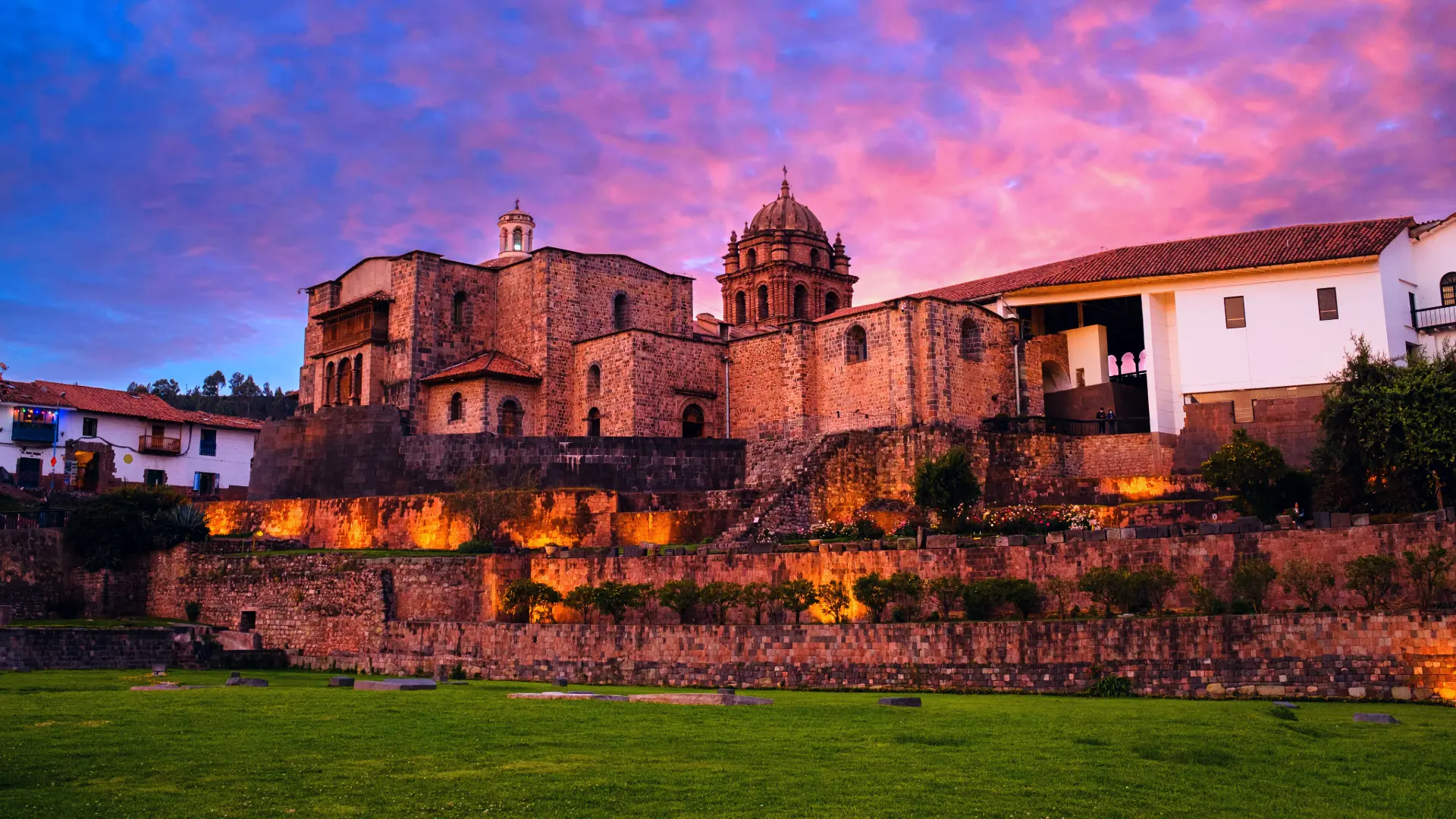 Sunset view of Qorikancha in Cusco, Peru, showing Incan stonework and the colonial Church of Santo Domingo – Magical Cusco Travel Agency