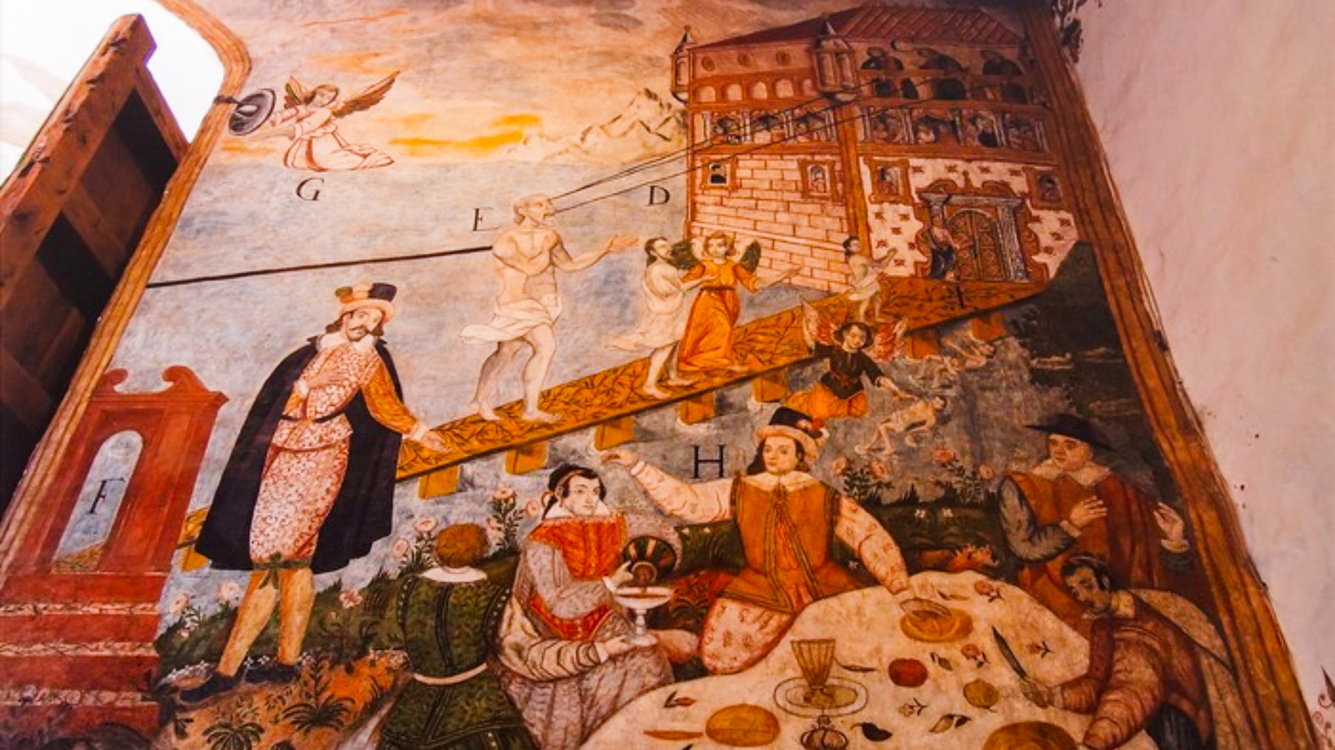 Detail of the celestial Andahuaylillas Murals known as 'Road to Heaven' (Camino al Cielo), illustrating vibrant Baroque religious figures and themes. - Magical Cusco Travel Agency