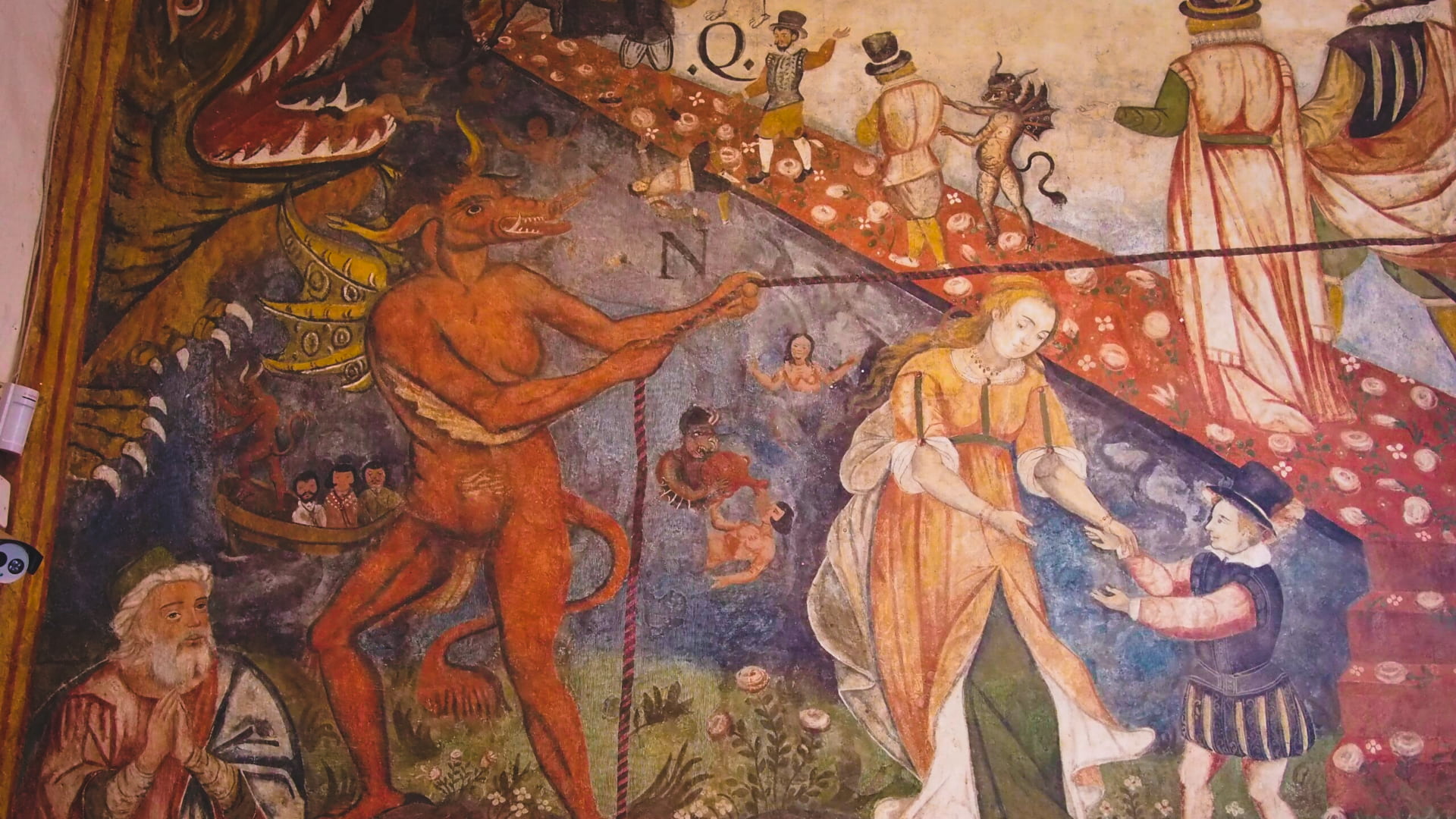 Close-up of the dramatic Andahuaylillas Murals known as 'Road to Hell' (Camino al Infierno), depicting Baroque-era moral and religious themes. - Magical Cusco Travel Agency